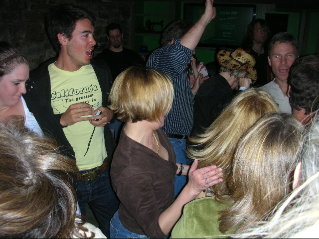 people dancing in a pub