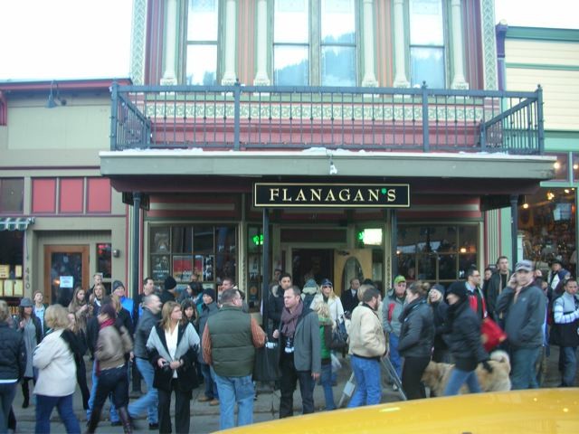 Street full of people in front of Flanagan's